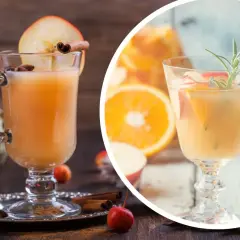Orzeźwiający mocktail z jabłek i pomarańczy, ozdobiony cynamonem i rozmarynem, idealny na jesienne popołudnie.
