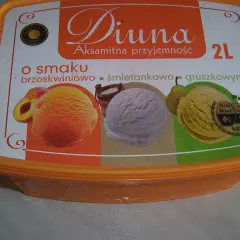 Lody Diuna w smaku brzoskwiniowo-śmietankowo-gruszkowym. Trzy gałki lodów: pomarańczowa, jasnoróżowa i żółta.