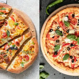 Pinsa co to? Dwie pyszne pizze: jedna z pomidorkami i ziołami, druga z papryką, oliwkami i cebulą.