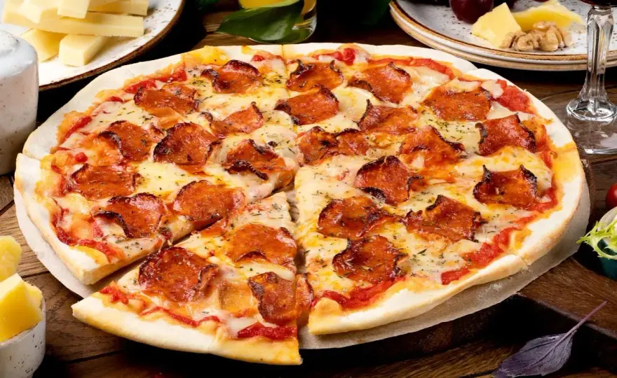 Najlepsze dodatki do pizzy - Jak łączyć smaki i unikać błędów?